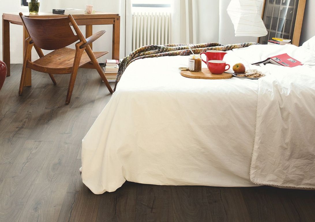 Sol stratifié IMPRESSIVE ULTRA Quick Step, aspect Bois brun, lame 19.00 x 138.00 cm